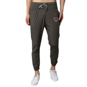 กางเกงวิ่งขายาวผ้าคอตตอน100% สำหรับผู้ชายกางเกงผ้าฟลีซปักลายเอวยางยืดสีสันกลางเอวเข้ารูปบริการ OEM - Product Image 1