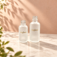 Botol Minyak Atsiri Kaca dengan Pipet Tetes untuk Kemasan Kosmetik 30ml 50ml Botol Minyak Atsiri Transparan Berlapis Embun dengan Logo Cetak Sablon