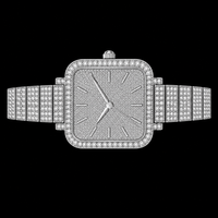 Montre bracelet élégante et scintillante pour femme en acier inoxydable argenté, mouvement à quartz, avec cadran carré et lunette pavée de cristaux de luxe