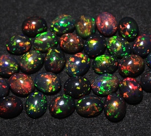 Natural Black Ethiopian Opal Gemstone Oval Cut Cabochon with Multi Color Play of Color or <b>Fire</b> for Jewelry Making - Product Image 1