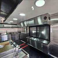 Remorque de cuisine mobile noire avec auvent à double essieu et fenêtre de service pour la vente de burgers, de grillades, de glaces et de nourriture de rue
