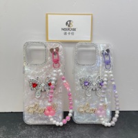Coque de téléphone à motif papillon en strass, coque rigide transparente avec bracelet perlé, coque de téléphone tendance antidérapante et résistante aux chutes