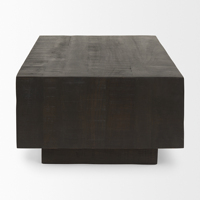 Table basse en bois de manguier massif, finition brute, surface lisse, forme carrée, style industriel moderne pour salon.