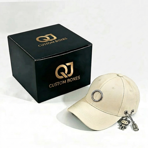 กล่อง QJ แบบเป็นมิตรต่อสิ่งแวดล้อม กล่องกระดาษลูกฟูกบุฟองน้ำเคลือบด้าน สำหรับหมวกเบสบอล จัดส่งจำนวนมาก พิมพ์ลายตามสั่ง หมวกทรงทันสมัย - Product Image 1
