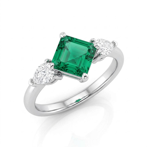 Anillo de compromiso clásico para mujer con tres piedras de gema verde corte esmeralda y diamantes de corte brillante en forma de pera con engaste de garras - Product Image 1