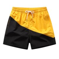 Shorts de sport pour homme en nylon bicolore, style décontracté, 100% polyester, pour la gym et la course à pied