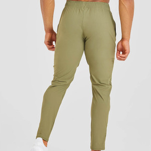 High Quality Men's Olive Green <b>Slim</b> Fit Breathable Stretch Fabric <b>Joggers</b> For Men's Elasticated Waistband & Zip Detailing On Cuf - Product Image 2