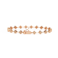 Bracelet élégant pour femme en or rose 10k 14k 18k, motif floral ethnique, avec des liens sertis de diamants, présentant des motifs de fleurs à quatre pétales faits à la main