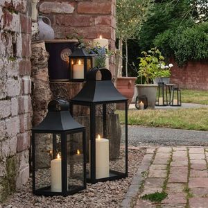 Durable metal candle lantern with strong handle easy to carry for outdoor activities and <b>emergency</b> <b>lighting</b> purposes - Product Image 1