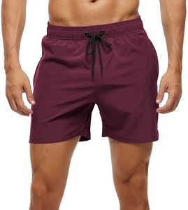 Shorts de plage sur mesure avec tissu à séchage rapide, poches zippées et doublure en mesh, 100% polyester, fabriqués au Pakistan - Product Image 1
