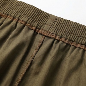 Jupe midi évasée pour femme, taille élastique, cordon de serrage, poches, couleur unie, style décontracté, vert olive, mélange polyester-coton - Product Image 4