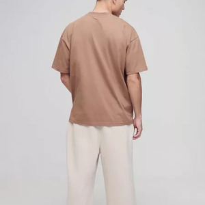 T-shirt unisexe de haute qualité à motif 3D en relief, coupe ample, couleur unie, impression de logo en relief personnalisée - Product Image 1