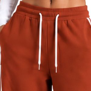 Conjunto Deportivo de Dos Piezas para Mujer, Color Naranja Quemado y Blanco, Top Corto de Manga Larga, Pantalones Anchos, Ropa Deportiva Informal - Product Image 6