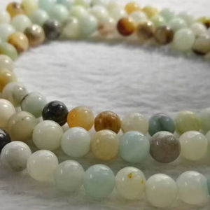 ลูกปัดหินอะมาโซไนต์ทรงกลมเรียบเนียนแบบเต็มเส้น สำหรับทำเครื่องประดับ DIY ขายส่ง - Product Image 1