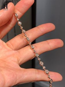 Pulsera de tenis con diamantes ovalados y redondos engastados en bisel, de oro de 14K, con cadena de eslabones y múltiples piedras alternadas. - Product Image 2