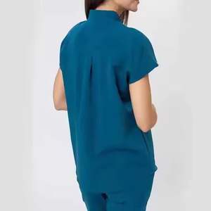 Tenues médicales en denim de coton personnalisables et tendance – Créez votre propre ensemble d'hôpital en gros, comprenant une veste et un pantalon de jogging - Product Image 2