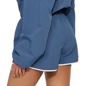 Conjunto deportivo corto de nailon y poliéster con cremallera, bordado y cortavientos para verano - Product Image 1