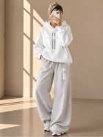 Ensemble survêtement décontracté en molleton deux pièces pour femme : sweat à capuche oversize uni et pantalon large – Vente en gros