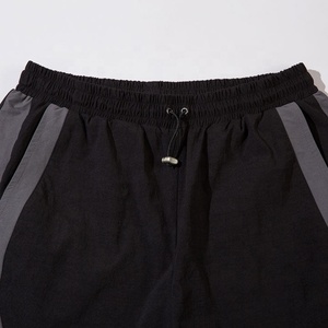 Pantalon de jogging décontracté pour homme, coupe ample, à blocs de couleur, taille élastique, séchage rapide, léger, en nylon hydrofuge - Product Image 5