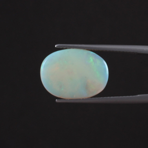 โอปอลสีขาว พลอยหลวม 4.05 กะรัต ธรรมชาติ รับรองโดย IGI รูปทรงวงรี คุณภาพสูง ขัดเงาด้วยมือ ผ่านการเคลือบด้วยแว็กซ์/น้ำมัน ขนาด 17.5x12.5 มม. - Product Image 1