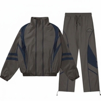 Ensemble coupe-vent en nylon personnalisé avec logo OEM pour homme, streetwear, coupe ample, ensemble de survêtement bicolore, veste et pantalon de jogging deux pièces