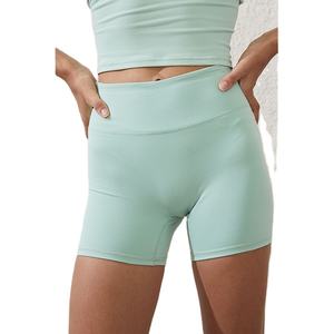 กางเกงขาสั้นออกกำลังกายผู้หญิงคุณภาพสูงขายส่งแบบกำหนดเอง ผ้าโพลีเอสเตอร์/อีลาสเทน ยืดหยุ่นได้ ขายดี - Product Image 4