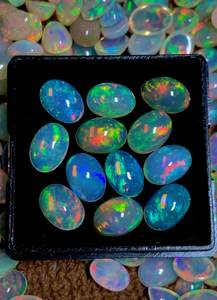 โอปอลเอธิโอเปียทรงหลังเบี้ย สีขาวรุ้ง พลอยธรรมชาติแบบเม็ดเดี่ยว สำหรับทำเครื่องประดับ ขายส่ง - Product Image 4