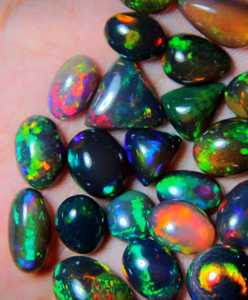พลอยโอปอลเอธิโอเปียสีดำทรงคาโบชอง ขนาดตั้งแต่ 2 ถึง 10 กะรัตต่อเม็ด - Product Image 3