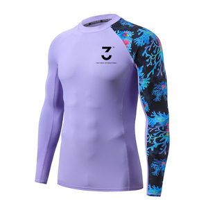 Fabrication sur mesure de rashguards pour hommes avec logo brodé, tissu spandex, couche de compression, fournisseur à bas prix. - Product Image 1