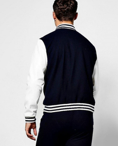 เสื้อแจ็คเก็ตวาร์ซิตี้สีกรมท่าและสีขาวสำหรับผู้ชายจาก Zico Industry ปักลายตัวอักษร ทรงปกติ กระดุมปิด แบบ Letterman - Product Image 4