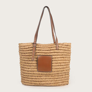 Complementa tus atuendos para el clima soleado con este encantador bolso de hilo natural con forma estructurada y detalles de cuero hoy. - Product Image 5