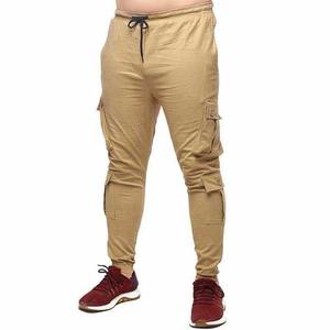 กางเกงคาร์โก้สีกากีสำหรับผู้ชาย เอวยางยืด ปิดด้วยเชือกผูก มีกระเป๋าหลายช่อง สไตล์ลำลอง ระบายอากาศได้ดี น้ำหนักปานกลาง ผลิตจากโพลีเอสเตอร์ เหมาะสำหรับใส่ในฤดูใบไม้ร่วง - Product Image 1