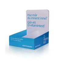 Présentoir de comptoir en carton pour produits de soin de la peau en supermarché