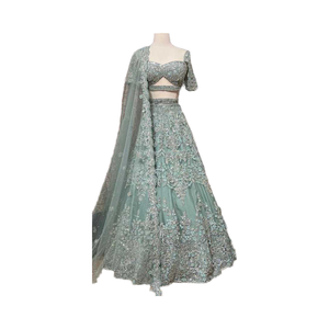 Lehenga choli งานแฮนด์เมดคุณภาพสูงสำหรับผู้หญิงเดรสผ้าไหมและผ้าตาข่ายปักสำหรับงานแต่งงานและงานปาร์ตี้เทคนิคการพิมพ์ด้วยมือ - Product Image 1