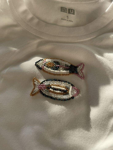 Camiseta sin mangas de moda con bordado de cuentas de semillas, elegante y de gran venta, personalizable en color blanco. - Product Image 1
