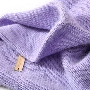 Gorro ligero y transpirable que ofrece calidez, flexibilidad y un estilo sencillo para el uso diario. - Product Image 4