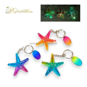 Llavero de recuerdo de estrella de mar de colores llamativos que brilla en la oscuridad, artículos de tienda de regalos - Product Image 4