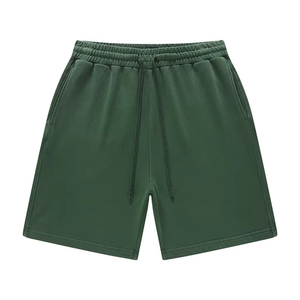 Shorts unisexes en coton vert uni avec cordon de serrage à la taille et poches latérales pour l'été - Product Image 1