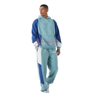 Fabricant de vêtements OEM Ensemble de survêtements légers de style streetwear à séchage rapide pour hommes en coton uni pour la saison hivernale à imprimé bouffant - Product Image 1