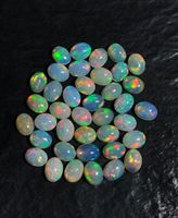 Opale éthiopienne de forme ovale, cabochons d'opale éthiopienne naturelle. Opale multi-feu à vendre.