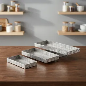 Elegantes bandejas de metal plateadas en forma de nido, juego de 3, con un motivo texturizado de corteza de árbol, ideales para presentaciones contemporáneas en la mesa. - Product Image 5