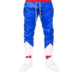 กางเกงกันลมกันน้ำคุณภาพสูงน้ำหนักเบา สตรีทแวร์ลำลอง สำหรับวิ่งออกกำลังกาย ชุดกีฬา รับผลิตแบบ OEM ODM - Product Image 1