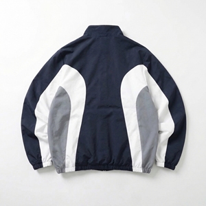 Chaqueta Deportiva Color Gris Marino y Blanco — Chaqueta Ligera con Cierre y Detalles de Paneles y Dobladillo Elástico |   Unisex OEM/ODM Marca Privada - Product Image 2