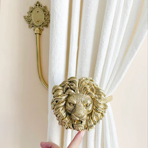 Gancho para cortina con diseño de cara de león, acabado en oro metálico, perfecto para la sala de estar y decoración de interiores con temática real, procedente de la India. - Product Image 1