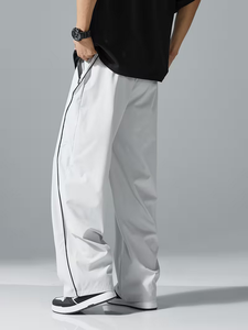 Pantalon de jogging décontracté pour homme, coupe ample et élastique, style urbain, léger en polyester, avec bandes latérales, poches et cordon de serrage - Product Image 2