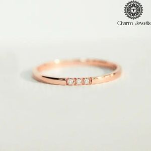 Bague de fiançailles minimaliste pour femme Charm_Jewells, plaquée or rose, sertie de trois pierres de moissanite taille coussin, certifiée IGI - Product Image 1