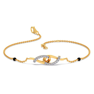 Bracelet en diamants ovales entrelacés avec chaîne en or jaune et accent latéral en pierre noire - Product Image 1