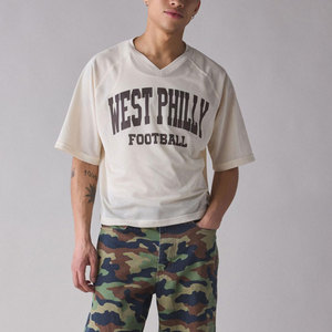 เสื้อยืดคอกลมแขนสั้นสีขาวสำหรับผู้ชาย ลายพิมพ์ฟุตบอลเวสต์ฟิลาเดลเฟีย ทรงปกติ สไตล์สตรีท ระบายอากาศได้ดี เป็นมิตรกับสิ่งแวดล้อม สีพื้น - Product Image 1