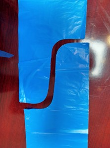 LLDPE 3mil S-shape Handle <b>Trash</b> <b>Bag</b> With Star Seal Bottom Heavy Duty Perforated on Roll Made in Vietnam - Product Image 5