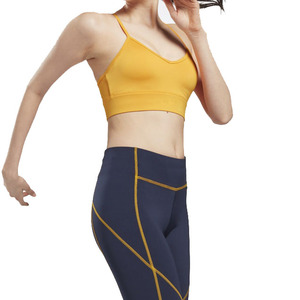 Soutien-gorge de sport jaune à col en V et bretelles spaghetti pour femme, maintien moyen, respirant, sans coutures, pour yoga et activités sportives, couleur unie - Product Image 2